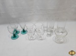 Lote de 12 taças diversas em vidro e cristal. Tamanhos diversos, medindo a maior 17,5cm de altura.