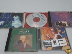 Lote de 5 cds originais diversos, composto de U2, Mozart, etc.