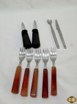 Lote de diversos talheres, composto de garfos, colher bailarina, etc.