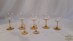 Jogo de 7 taças diversas em cristal , sendo 2 taças abertas, 11 cm altura, ,2 para vinho, 12 cm ,2 para aperitivo,10,50cm,2 licor 8,5 cm altura. Algumas taças apresentam pequeno bicado.