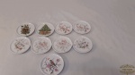 9 descansos de copo em porcelana decoradas com flores. Medida 8 cm de diametro