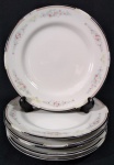 SCHMIDT - Lindo e antigo conjunto constando 6 pratos para sobremesa, confeccionados em porcelana na cor branca, magnificamente esmaltado a mão, com borda decorada por Flores.  Med 19 cm.