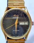 MIDO - "Multifort" Antigo relógio de pulso suíço automático, com caixa e pulseira em plaquedor. Funcionando. Med 3,5 cm.