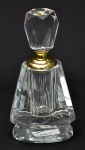 Grande perfumeiro possivelmente romeno estilo art deco, em grosso cristal de rocha facetado, guarnição em metal dourado, alt. 14cm.