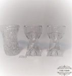 Par de castiçal co pewqueno vaso em vidro todos medem 9 de altura