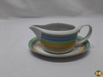 Molheira com presentuir em porcelana Vista Alegre. Medindo 18cm de comprimento x 7,5cm de altura.