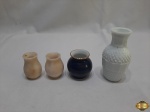 Lote de 4 miniaturas de vasos em materiais diversos. Medindo o maior em vidro opalinado 10,5cm de altura.