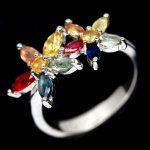 Delicado Anel em prata de lei espessurada a ouro branco , design moderno floral com Safiras multi coloridas e delicados botões de Citrino , totalizando 14.63 cts . Perfeito estado de conservação, sem uso . aro mede 1,6 cm . origem Brasil , África .