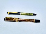 Lote composto por 01 caneta tinteiro Lamar Germany e 01 por uma caneta Tinteiro Alemã marmorizada . Ambas em bom estado de conservação , possui marcas de uso .