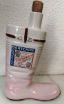 Antiga garrafa em porcelana de licor BATERNIKE em forma de bota . Mede: (Rej)