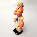 BONECO MARINHEIRO POPEYE ORIGINAL MARCA ESTRELA. DÉCADA DE 90 PROMOCIONAL HABBIS. TAMANHO: 11,5 CENTÍMETROS DE ALTURA. MATERIAL EM VINIL, EMBORRACHADO, COM MARCAS DE USO.