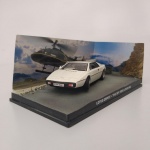 9 - COLEÇÃO OFICIAL DOS CARROS DE JAMES BOND 007. REPLICAS DETALHADAS EM ESCALA 1:43 DO AGENTE BRITÂNICO. MINIATURA METÁLICA MODELO LOTUS ESPRIT.  APROXIMADAMENTE 12,0 CM BASE ACRÍLICA E BLISTER DE PROTEÇÃO.