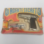 PISTOLA BRINQUEDO O AGENTE SECRETO 1911 ESTRELA. BRINQUEDO FUNCIONANDO E CAIXA DANIFICADA.
