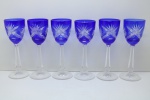 CRISTAL EUROPEU - Conjunto de 6 taças em cristal double lapidado, cor predominante azul. Alt. 20 cm.