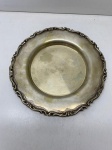 PRATA DE LEI - Salva prata repuxada, prata Águia . Dia. 18 cm e peso 106 gr. PEÇA NÃO EXPOSTA NO LEILÃO, A MESMA ENCONTRA-SE NO COFRE DO BANCO.