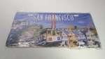Placa de carro com tema da cidade de San Francisco do estado da Califórnia nos Estados Unidos. A escrita e o bonde são em relevo