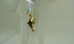 Pingente  Golfinho Em Ouro Amarelo 18k,  16mm, Peso: 0,2g, Valor de Mercado: R$ 200,00