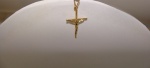 Pingente Em Ouro Amarelo 18k, crucifixo, Peso: 0.4 Gramas, valor de mercado: R$ 210,00