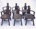 Seis cadeiras com assento em madeira, duas delas com iniciais JM no encosto. Med. 87x54x45 cm.