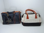 ACESSÓRIOS - Lote de 2 bolsas em couro, sendo 1 LUZ DA LUA e 1 RENATA DI BIASSI. Med. 20x38 cm e 40x45 cm.