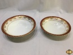 Lote de 2 bowls em porcelana Steatita friso frutacor vinho com ouro. Medindo o bowl maior 24cm de diâmetro x 6,5cm de altura.