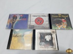 Lote de 5 cds originais, composto de Rita Lee, João Gilberto, etc.