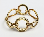 TADINI  LINDA PULSEIRA EM OURO 18 K COM ELEGANTE DESIGN FORMADO POR CÍRCULOS E ESTRUTURA HELICOIDAL. 18 CM DE COMPRIMENTO. 46,4 GNOTA: LUCIANO TADINI, foi um grande joalheiro italiano radicado em São Paulo. Sua ligação com joalheria começou na infância, em suas incursões na oficina de seu tio, também joalheiro. Foi lá que nasceu o interesse pelo ofício. Fez diversos cursos ainda na Itália e ao chegar ao Brasil ainda no início do ano de 1951, já era um conceituado profissional joalheiro. Suas joias aliam design e qualidade da produção de ourivesaria italiana.