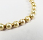 COLAR DE PÉROLAS SAUTH SEA COM 5 MM MONTADOS COM ESPAÇADORES EM OURO 18K E DOTADA DE FECHO TAMBÉM EM OURO. 44 CM DE COMPRIMENTO. 34,3 G