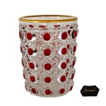 Copo em cristal francês, ornamentado por lapidação pastilhada sobre em vermelho rubi sobre incolor. Borda rematada por filete em ouro. Séc. XIX. 10 cm.