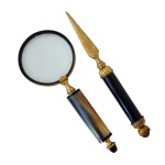 Conjunto para escritório composto de lupa (25.5 cm  Lente 10 cm) e espátula para abrir correspondência (27 cm).