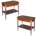 JEAN-CLAUDE BAILLY (famoso designer francês ativo no Brasil na década de 1950-60) - Par de mesas de estilo inglês em madeira nobre. Corpo composto por dois níveis de dimensões retangulares, sustentada por colunas torneadas, repousando sobre sapatas de bronze. Parte frontal superior com duas pequenas gavetas. Detalhes em metal amarelo, compõe o conjunto. 68 x 70 x 40 cm. O decorador, enviado ao Brasil para representar a famosa Maison Jansen de Paris acabou se fixando no eixo Rio  São Paulo, inovando um estilo conhecido como Clássico Francês, mobiliando com suas criações as mais famosas residências brasileiras.