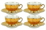 MAUÁ - Quatro Elegantes Xícaras de Café com seus respectivos pires, em fina porcelana toda em ouro com relevos e detalhes em prata; marca da manufatura na base. Dimensões: 4 cm X 6,5 cm (Alt./Diâm.). c