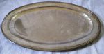 Sem marca - Grande travessa oval em metal espessurado a prata, (Obs. Apresenta riscos) aprox. 70 x 45 cm 
