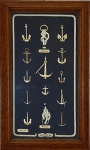 Quadro decorativo representando nós de marinheiro. 43 x 23 cm.