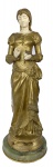 ADRIEN ÉTIENNE GAUDEZ (1845-1902).  Marguerite. Escultura em bronze com mãos e rosto em marfim. Base de ônix 15,5 cm de diâmetro. 44 cm de altura total. Assinada.