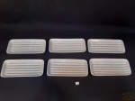 Jogo de 6 pratos em ceramica vitrificada branca americana para servir aspargos.  Medida 21X9,5 cm.