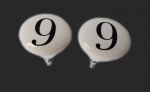 Par de puxadores em porcelana com o número "9".