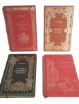 Lote com 4 (quatro) livros de romance e contos em capa dura com letras ouro.
