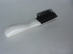 Escova para cabelos (massageadora) funciona na pilhas, ver fotos.