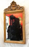 Espelho Francês com moldura em madeira patinada a ouro.                       Séc. XIX.                                                                                                                         Med. Alt. 1.05 x 55.5 cm. c/ mold.                                                                                         68 x 45 cm. s/ mold.