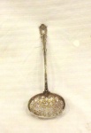 Pegador de azeitonas em prata brasileira.                                                       Teor da prata: 833                                                                                                Medidas: Compr. 19 cm.