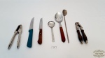 Kit cozinha com 7 peças sendo 2 quebra nozes,2 facas jantar, 1 colher de chá,  1 colher servir e 1 colher para suco/bailarina.
