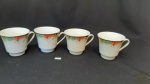 4 xicaras , canecas em porcelana decoradas.