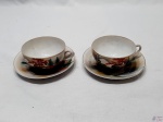 Par de xícaras de café em porcelana oriental com pintura de moinho d'água.