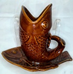 Molheira em formato de peixe em faiança. 17 x 17 cm. Provavelmente Weiss.