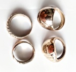 Quatro anéis em prata , , modelos e aros diversos .