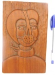 Antigo quadro esculpido na madeira representado pela escrava Anastácia.Medidas : 20,5 cm de comprimento X 13 cm de largura.