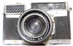 Antiga máquina fotográfica , marca Fuji Photo,modelo Fujica 35-SE ,fabricado no Japão,possui capa, não testado e sem garantias de funcionamento.