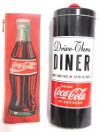 Caneca promocional da Coca - Cola, produto oficial, possui líquido para levar ao refrigerador ,medidas: 16 cm de comprimento X 09 cm de diâmetro.