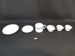 Lote de 4 xicaras e 2 pires em porcelana diversas.Medida pires cha  15 cm de diâmetro, pires cafe 10 cm de diâmetro. Xícara  cha  10 cm de diâmetro, 5,5 cm de altura,  xicara de cafe  7 cm de diâmetro, 4 cm de altura.